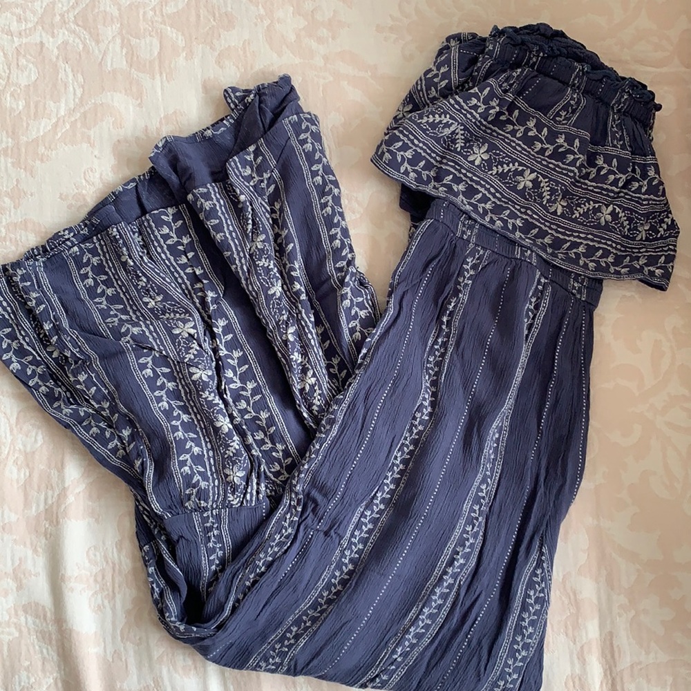 Flared pant off the shoulder jump suit